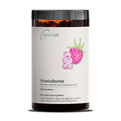 Multivitamin Gummibärchen in einer Dose mit weißem Etikett, beschriftet mit "VitaminBombe" vor neutralem Hintergrund.